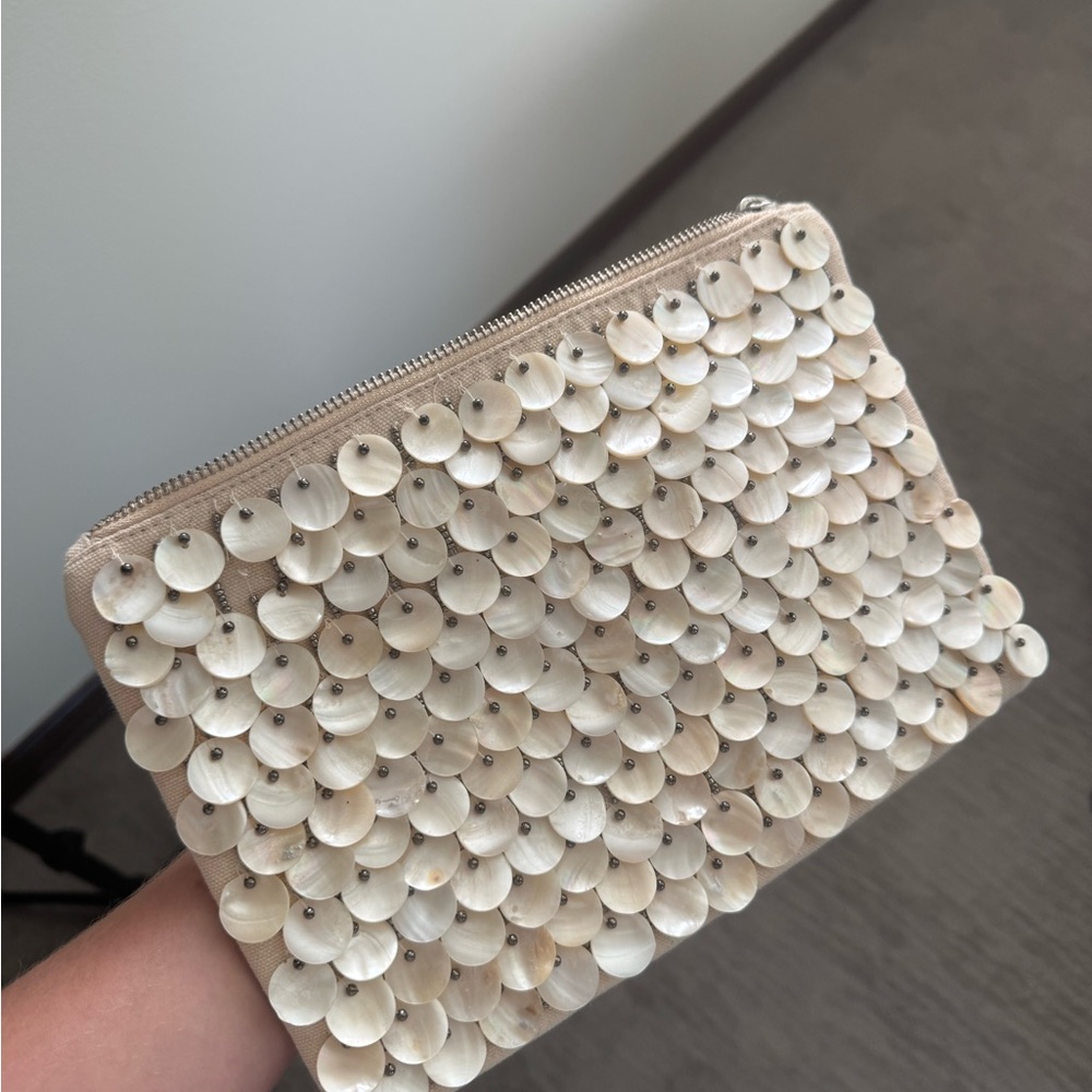 Elegant Cream Clutch with Shell Accents
